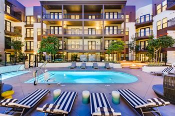 Relaxing resort-style pool with sundeck and spa